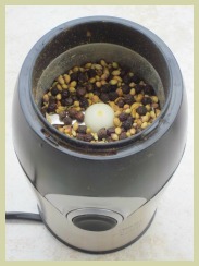 whole spices in a grinder